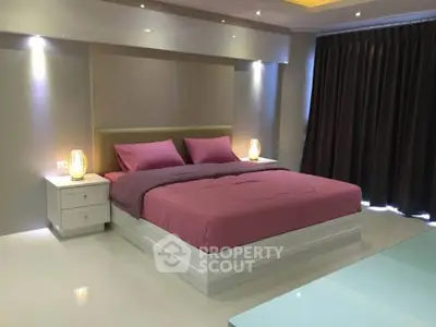 Luxurious bedroom with modern design and ambient lighting