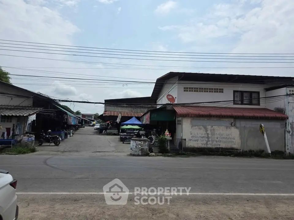 Charming rural property with traditional architecture and street view, ideal for local business or residence.