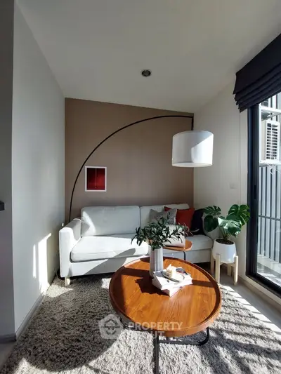 Chic modern living room with cozy white sofa and stylish decor