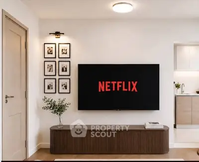 Modern living room with wall-mounted TV and stylish decor