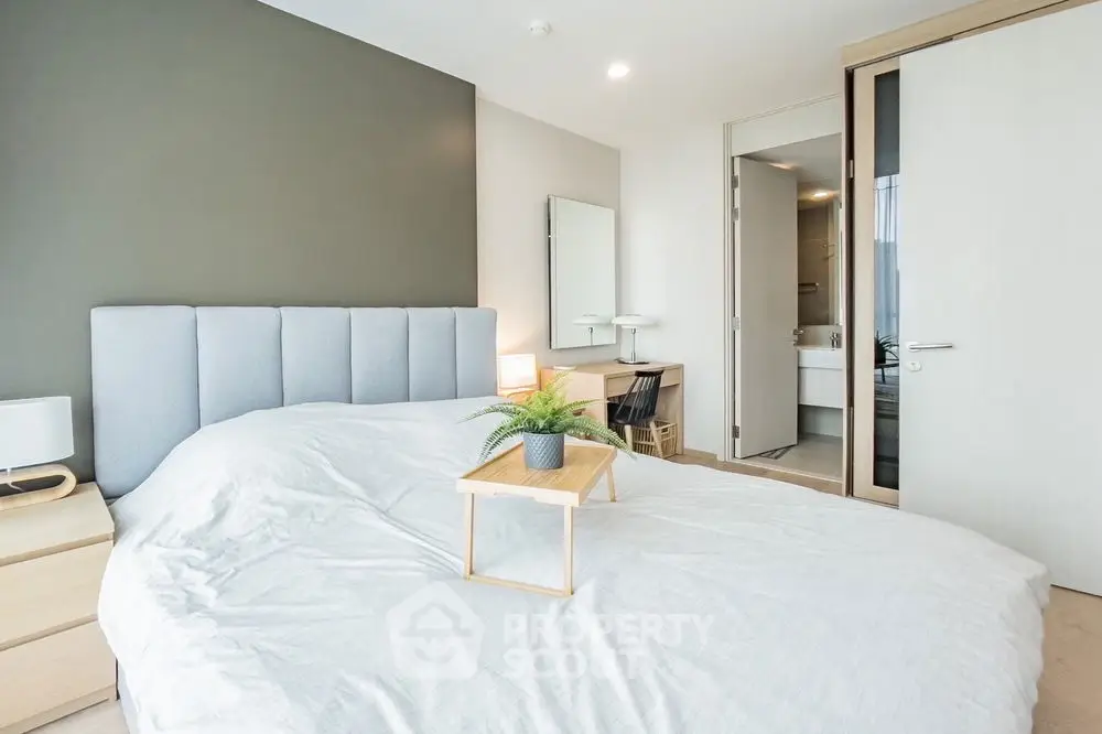 Modern bedroom with two beds and minimalist decor