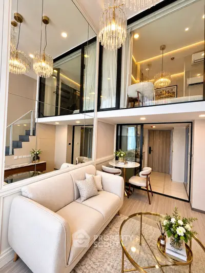 Luxurious modern duplex living room with elegant chandeliers and stylish decor