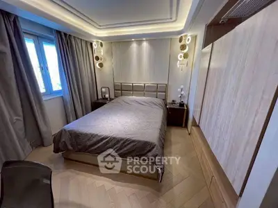 Modern bedroom with stylish lighting and cozy ambiance