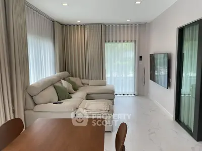 Modern living room with elegant decor and natural light