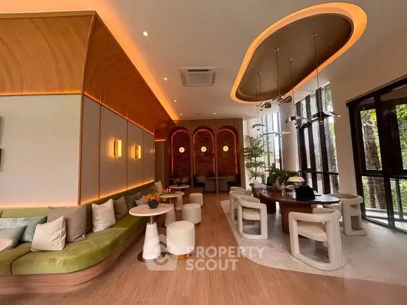 Luxurious modern living room with elegant lighting and stylish furniture, perfect for sophisticated gatherings.