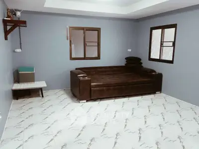 Spacious living room with modern sofa and stylish flooring
