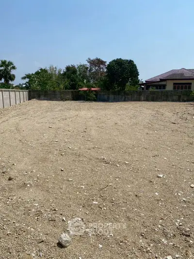 Spacious vacant land plot ready for development in a serene neighborhood.