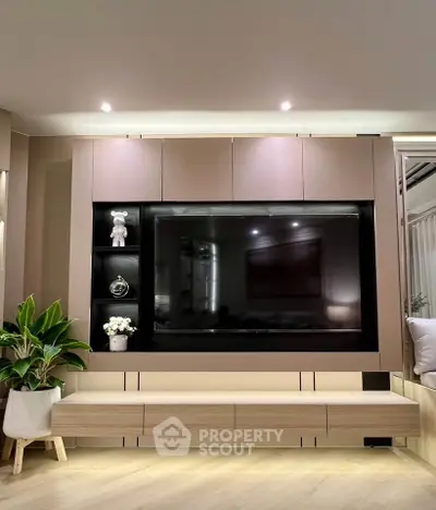 Modern living room with sleek TV unit and stylish decor