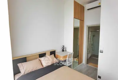 Modern bedroom with ensuite bathroom and stylish decor