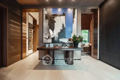 Luxurious modern interior with abstract art and elegant decor in a spacious living area.