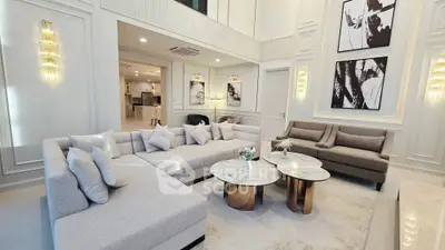 Luxurious modern living room with elegant decor and spacious seating area