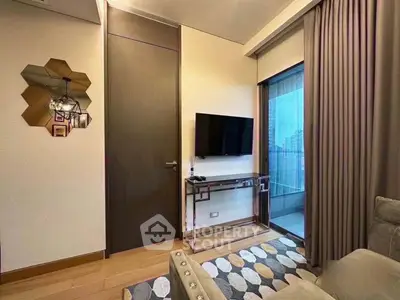 Modern living room with stylish decor and balcony view