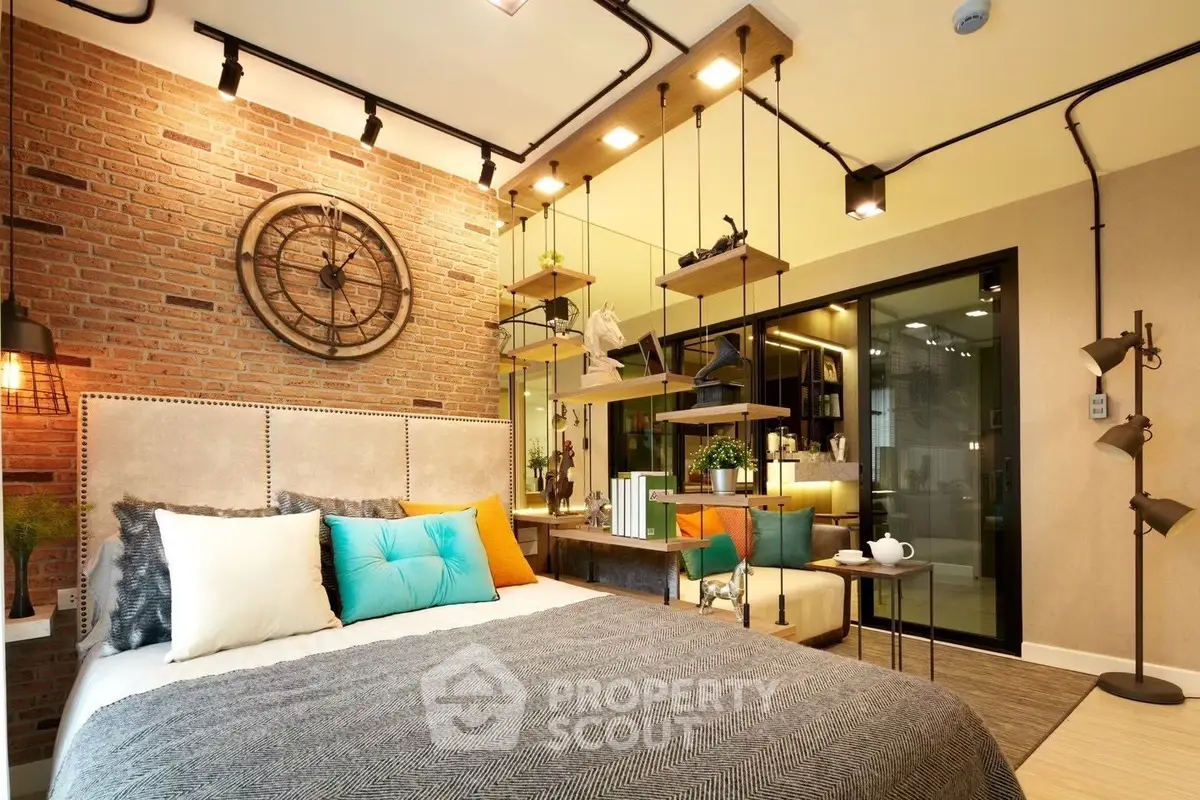 Modern bedroom with industrial design, exposed brick wall, and stylish lighting.