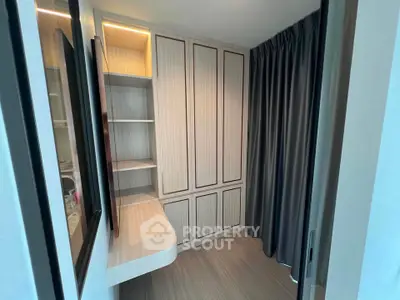 Modern storage room with built-in cabinets and sleek design