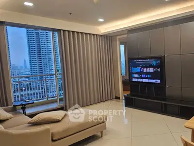 Luxurious living room with city view and modern entertainment setup