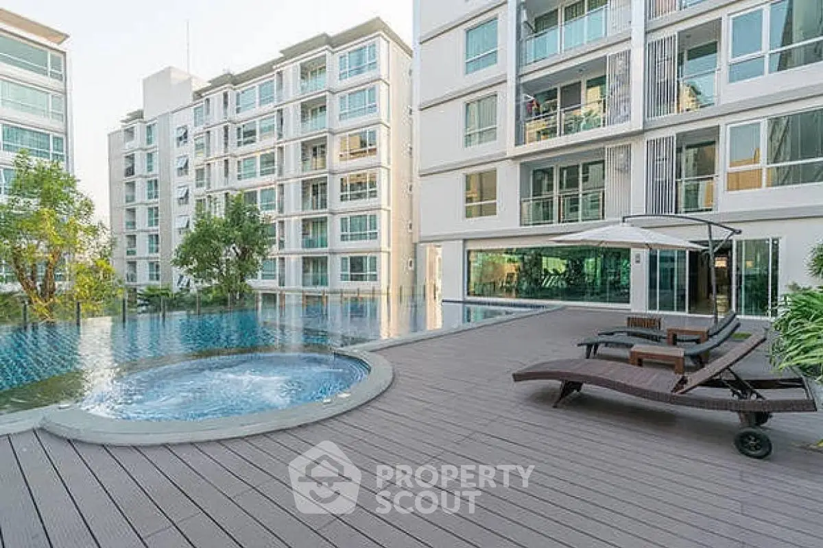 Luxurious condominium with pool and sun deck in serene setting