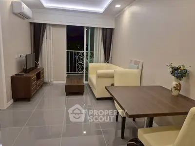 Modern living room with elegant furniture and balcony view