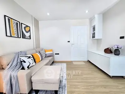 Modern living room with stylish decor and cozy seating area