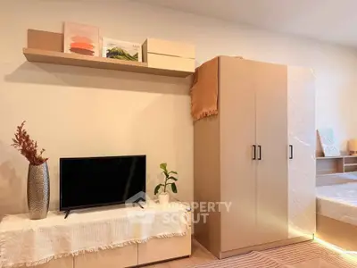 Cozy bedroom with modern decor and ample storage space