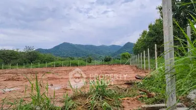 Scenic land plot with mountain views, ideal for development or investment.