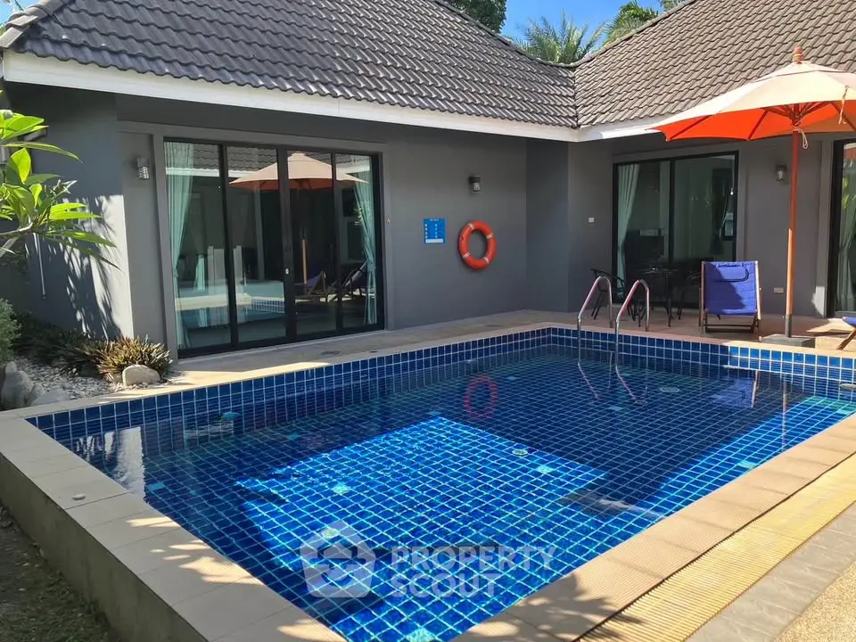Charming villa with private pool and sunlit patio, perfect for relaxation and entertaining.