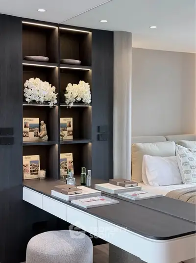 Modern living room with stylish shelving and elegant decor
