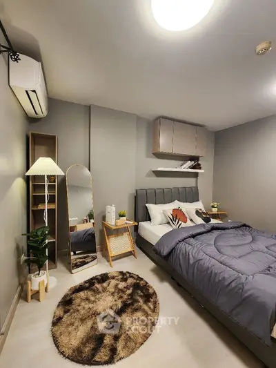 Modern bedroom with stylish decor and cozy ambiance