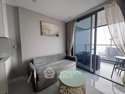 Modern living room with balcony view and stylish decor