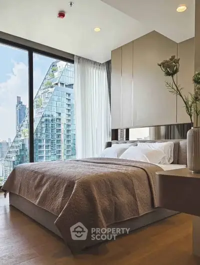 Luxurious bedroom with stunning city view and modern decor