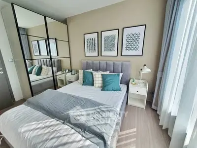 Modern bedroom with stylish decor and ample natural light