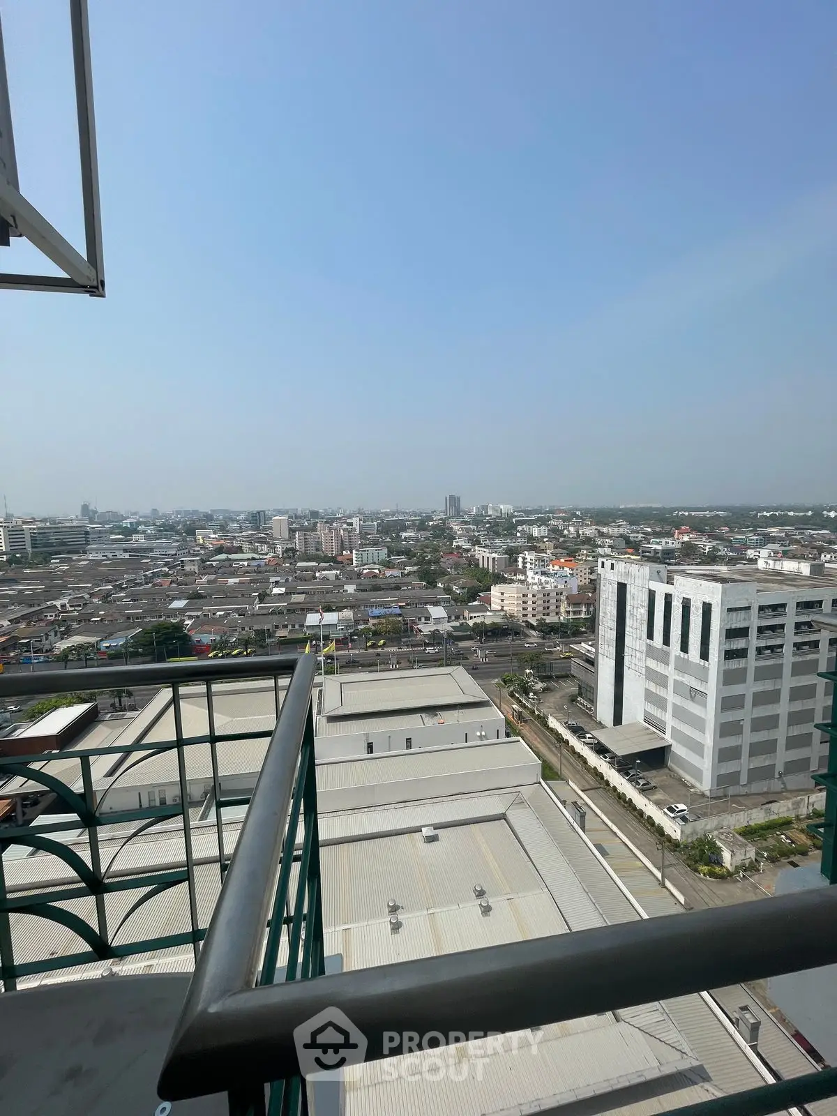 Stunning cityscape view from high-rise balcony with expansive skyline