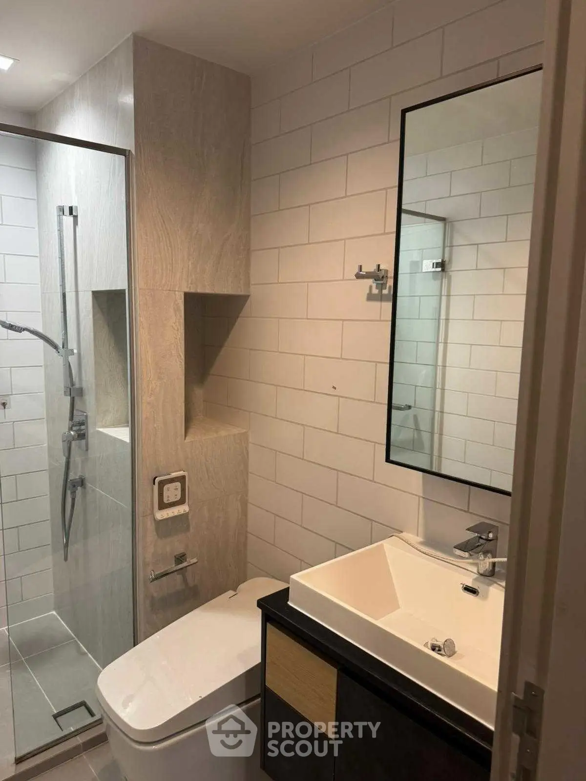 Modern bathroom with sleek design and glass shower enclosure