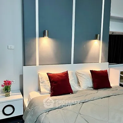 Modern bedroom with stylish lighting and elegant decor