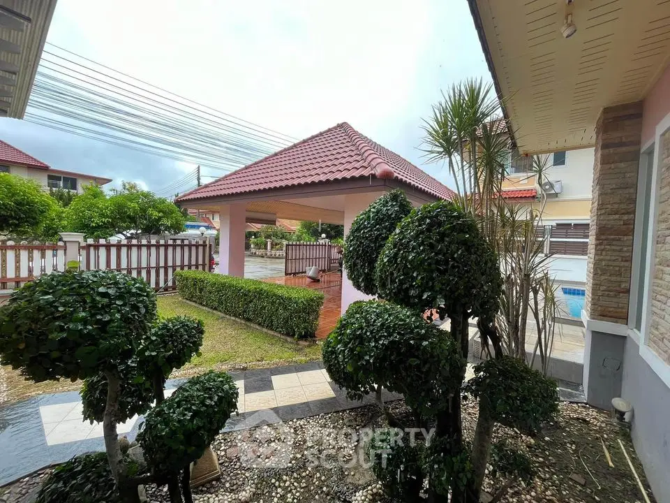 Charming garden view with gazebo in suburban home exterior
