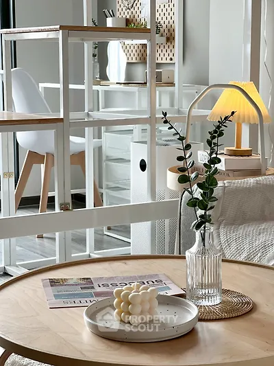 Stylish modern living room with elegant decor and natural light.