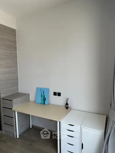 Modern study room with minimalist desk and storage units