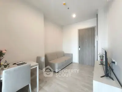 Modern minimalist living room with sleek furniture and neutral tones