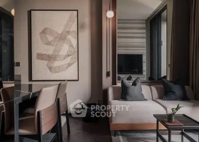 Stylish modern living room with elegant decor and cozy seating area.