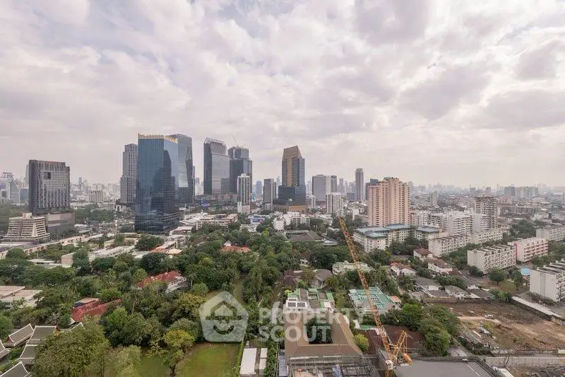 Stunning cityscape view showcasing modern skyscrapers and lush greenery, perfect for urban living enthusiasts.