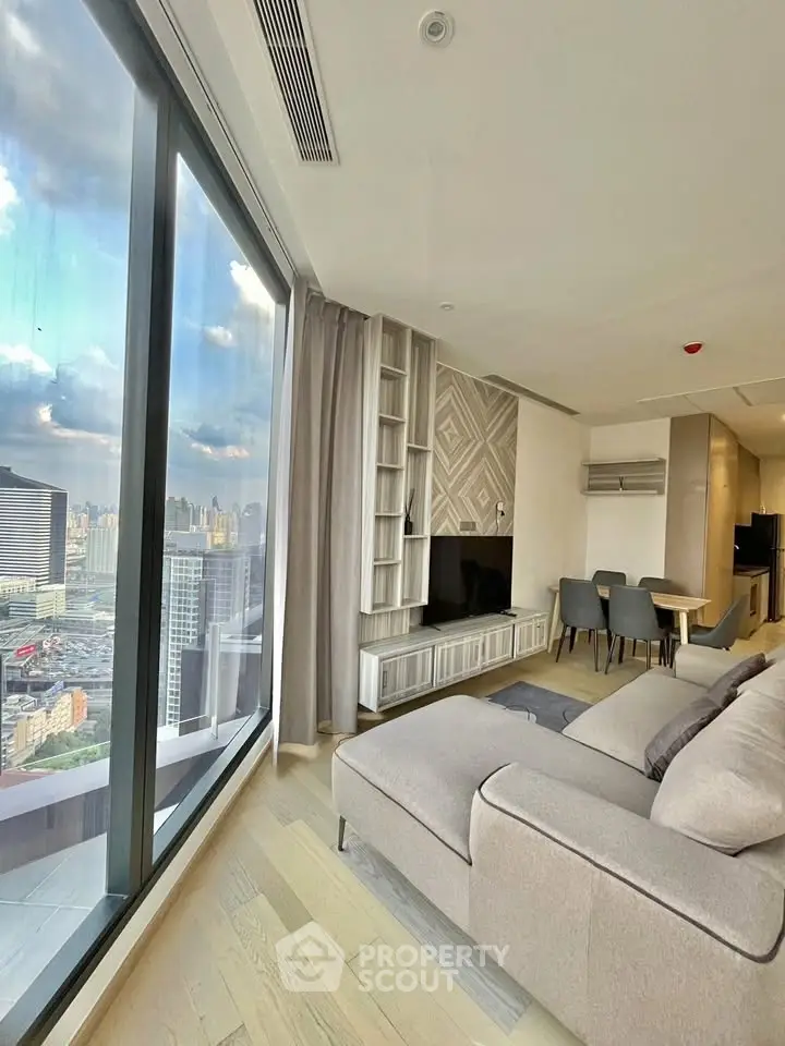 Luxurious modern living room with panoramic city view and elegant decor