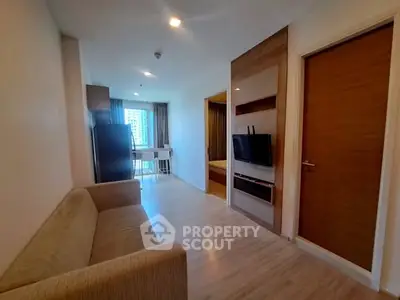 Modern apartment interior with cozy living area and stylish furnishings.