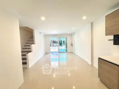 Spacious modern living room with open layout and natural light