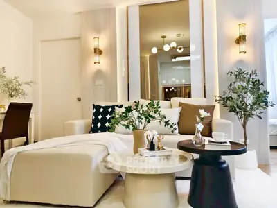 Elegant living room with modern decor and cozy seating area