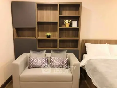 Cozy bedroom with modern decor and stylish shelving unit