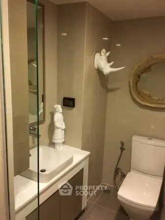 Modern bathroom with unique decor and sleek fixtures