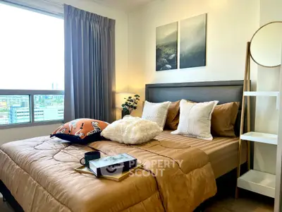 Cozy bedroom with stylish decor and city view, perfect for urban living.