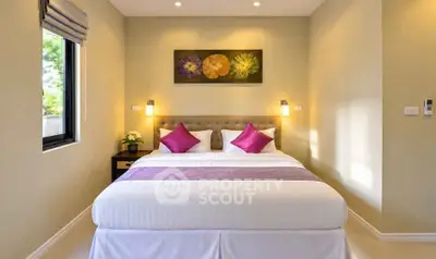 Elegant bedroom with modern decor and cozy lighting