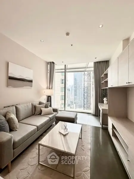 Modern living room with city view, stylish furniture, and natural light.