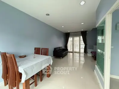 Spacious living room with elegant dining area and modern decor