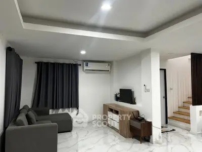 Modern living room with sleek furniture and stylish decor